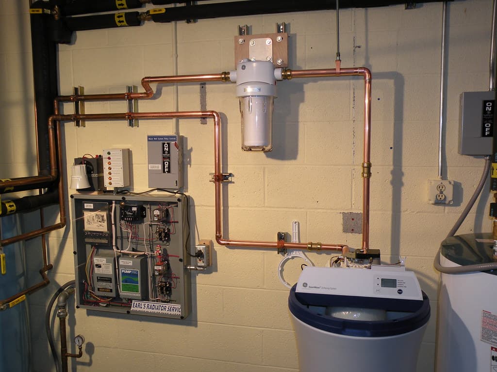 Whole-house water filtration and softening system installation