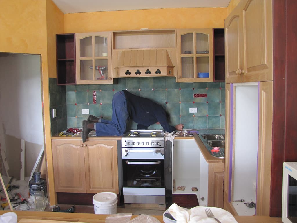 Gas stove installation during a kitchen renovation
